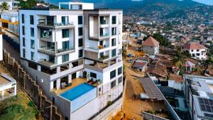 an aerial view of a building in a city at Elegant Hillside Ocean Stay in Freetown
