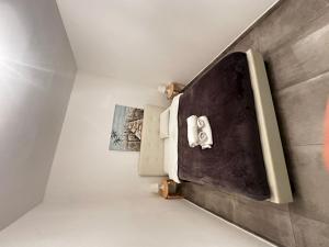 a room with a wall with a stove at Arsenia Cottage D - Kyperounta in Kyperounda +50 photos