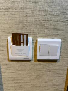 two white boxes sitting on top of a table at Al Maqam Alsharqy Shuttle Srevice to Haram in Mecca