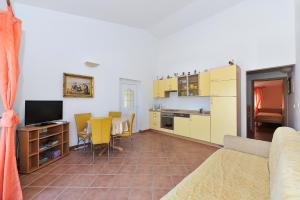 Kuchyň nebo kuchyňský kout v ubytování Apartments Dominique