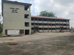 a large building with writing on the side of it at Engelbert Beyer Centre in Ibadan