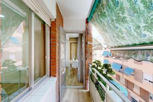 an internal view of a building with a large window at Apartamento Céntrico en Murcia in Murcia