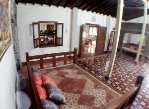 Voodi või voodid majutusasutuse Omah Pitoe Yogya Homestay toas