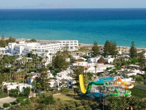 an aerial view of a resort with a water park at Creta Palace, A Resort to Live in Rethymno