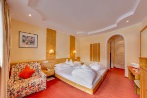 Postel nebo postele na pokoji v ubytování Hotel Berger Superior