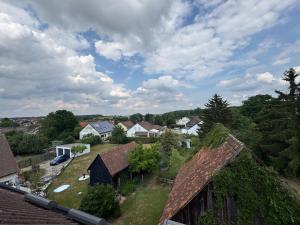 an aerial view of a residential neighborhood with houses at Gemütliche Maisonette nahe Dinkelsbühl in Schopfloch