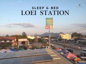 a roof with solar panels on top of a building at Loei Station in Loei