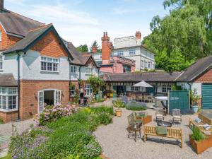 a courtyard of a house with a garden at 5 Bed in Church Stretton oc-t30413 in Church Stretton