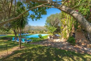 a view of the pool from the yard at Finca Son Xona in Capdepera