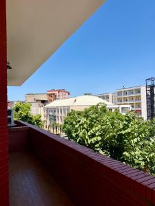 a balcony with a view of the city at Shkodra Central in Shkodër