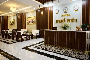 a hotel lobby with a pico not sign on the wall at Phố Núi 2 Hotel in Pleiku