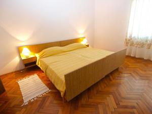 Postel nebo postele na pokoji v ubytování Apartments Radmila 977