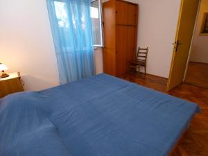 Postel nebo postele na pokoji v ubytování Apartments Radmila 977