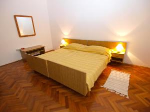 Postel nebo postele na pokoji v ubytování Apartments Radmila 977