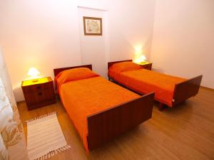 Postel nebo postele na pokoji v ubytování Apartments Radmila 977