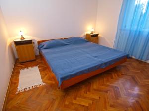Postel nebo postele na pokoji v ubytování Apartments Radmila 977