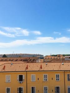 a group of buildings with red tile roofs at Casa Granata in Caserta