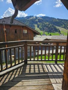 a view from the deck of a cabin with a view at Large Superior Style Chalet - Central Location in Morzine