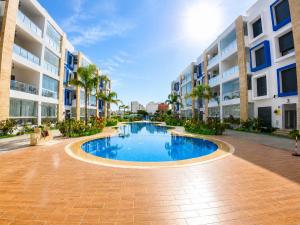 Bazen u ili blizu objekta Appartement Haut Standing - 5 personnes - Résidence Gardénia avec Piscine - Parking