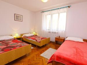 Posteľ alebo postele v izbe v ubytovaní Apartment Damir 864