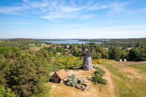 an aerial view of a small village with a windmill at Haus Silvana, App 03 Bungalow in Zempin