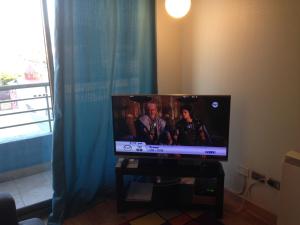TV a/nebo společenská místnost v ubytování Vista Apartments - Aire Acondicionado y Estacionamiento