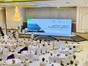 a group of people sitting in chairs in a room at القاعة الملكية للافراح والموتمرات in Baţḩāʼ