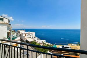 a view of the ocean from a balcony at Terrazza di Rosa - sea view in Praiano +43 photos
