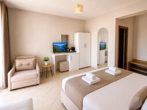En eller flere senge i et værelse på Avenue Hotel + 81 billeder