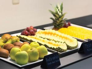 a buffet of fruits and vegetables on a table at Hotel Faranda Los Tilos, Ascend Hotel Collection in Santiago de Compostela +30 photos