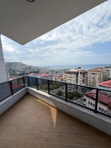 a balcony with a view of a city at Mimoza Apart in Trabzon