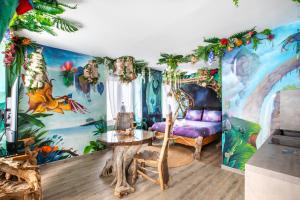 a room with a mermaid mural on the wall at Avataar - L'arbre de Pandoraa in Belfort