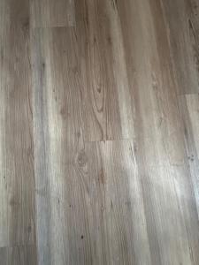 a close up of a hardwood floor with at Zybnb in Livonia