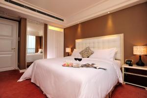 Imagem da galeria de Wealthy All Suite Hotel Suzhou em Suzhou