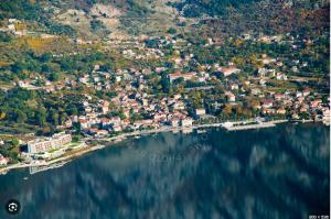 an aerial view of a town on a lake at Vista View Apartments in Risan