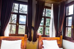 Postel nebo postele na pokoji v ubytování Şamlıoğlu Historical Villa