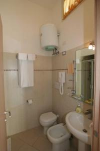 Koupelna v ubytování Hotel Maremma Sul Mare