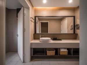 a bathroom with a sink and a mirror at Things grow in their native land in Ulanqab +29 photos