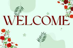 a welcome banner with flowers and the word welcome at ljp farm resort couple rooms in Tigaon