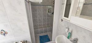a bathroom with a shower and a sink at Petrucci House in Vasto