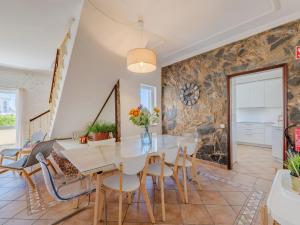 a dining room with a table and chairs at Holiday Home Casa do Sol by Interhome in Patroves +41 photos