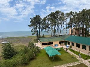 an aerial view of a house with a green roof at LizAna in Shekhvetili