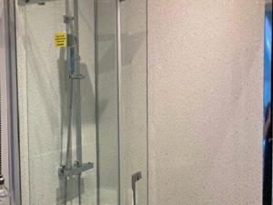 a glass door of a shower in a bathroom at Periwinkle No5 - Uk49249 in Althorne +4 photos