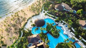 an aerial view of the pool at the excellence punta cana resort at Wyndham Alltra Punta Cana All Inclusive Resort in Punta Cana