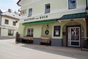 a building with a bench in front of it at Bockwirt in Schladming