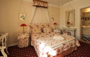 Postel nebo postele na pokoji v ubytování Sophiendal Manor