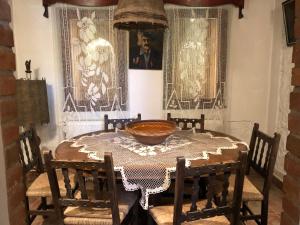 a dining room with a table with a bowl on it at Trnova Ruzica in Trnovac