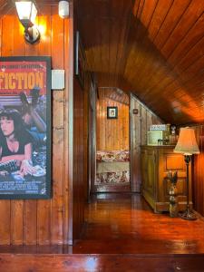 a room with a movie poster on the wall at Trnova Ruzica in Trnovac