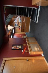 an overhead view of a stairway with wooden cabinets at Kervan Hotel Pendik in Istanbul