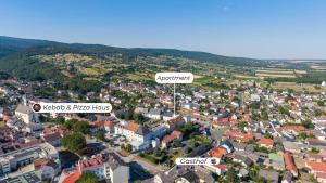an aerial view of a small town with buildings at Appartement im Schloßhof in Rechnitz